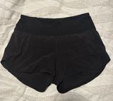 Speed Up High-Rise Shorts 4” Photo 0