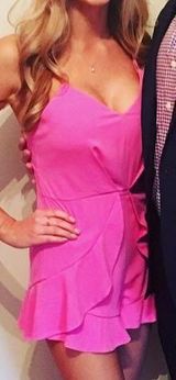 Pink Romper With Ruffle Detail Photo 0