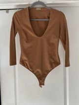 V Neck Body Suit Photo 0