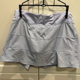 Lulu Lemon Pace Rival tennis skirt in soft purple. Photo 0