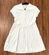 Calia woman’s medium golf SS energize v dress.  Photo 0