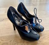 Gucci Vintage Leather Ankle Boots with Gold Lace Plate in Black Photo 0