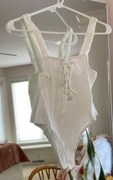 Forever 21 White Lace Up Body Suit Photo 0