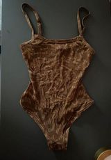 SKIMS Summer Mesh Bodysuit Photo 0