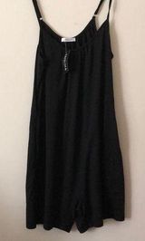 One Piece Women’s  hotshot romper black medium pockets comfy oversized Photo 0