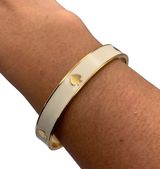 kate spade New York Off white gold toned spade Bracelet Photo 0