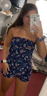 Divided Blue Floral Romper Photo 0