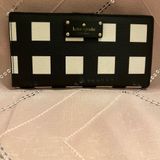 This is a very cool leather Kate spade clutch wallet Photo 0