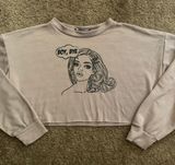 Medium Oversized Graphic Long Sleeve Round Neck Cut Off Crop Top Photo 0