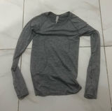 Grey Lululemon Long Sleeve Swiftly Tech size 4 rarely used, also have one in black if interested. Photo 0