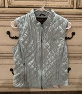 Teal Ariat Puffer Jacket and Blue Brandy Melville Sweats Photo 0