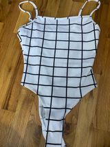 Black and White Body Suit Photo 0