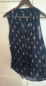 Button Down Sleeveless blouse Photo 0