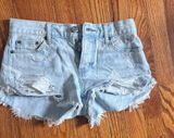 American Eagle light wash ripped jeans shorts size 0! Photo 0
