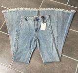 Blank Paige Frayed Bell Bottom Jeans size Medium Photo 0