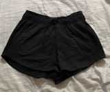 lululemon black inner glow shorts size 8 Photo 0