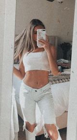 light wash distressed jeans Photo 0