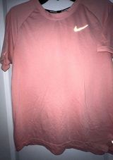 Experience Comfort and Performance with Womens Medium Nike DriFit Photo 0