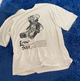 oversized white t shirt with teddy graphics Photo 0