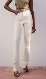 White Slim Flare Slit Hem Jeans Photo 0