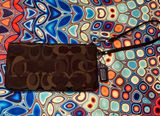brown coach wristlet Photo 0