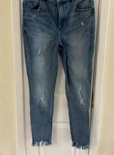 Express Blue Ankle Cropped Jeans with Distressed Details Photo 0