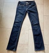 Women’s Size 28 Straight Leg Low Waisted Medium Wash Jeans. Photo 0