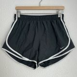 dark gray with white piping athletic running shorts women’s size L Photo 0