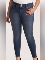 Torrid Premimum Ultimate Stretch Jeggings jeans, size 18R in medium wash. Photo 0