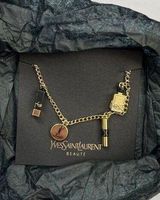 NWT Yves Saint Laurent Beaute Gold Charm Bracelet YSL VIP Gift  With Purchase Photo 0