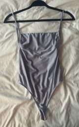 Out From Under Bodysuit Photo 0