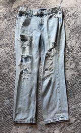 Ripped “Mom” Jeans Photo 0