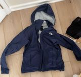 The North Face  Navy Rain Jacket Photo 0