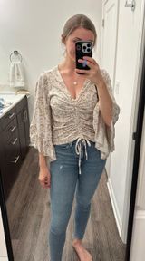 Buckle Long Sleeve V Neck Blouse Photo 0
