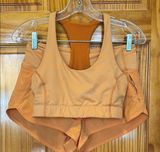 Orange Sports Bra and Shorts Set Photo 0