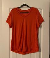 Tangerine ladies athletic top.  Size: L.  Good condition! Photo 0