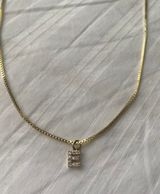 Gold E Necklace Photo 0