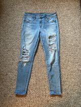 American Eagle Light Wash Distressed Skinny Jeans Photo 0