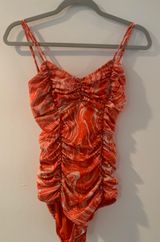 Michael Kors Orange Marble Printed One Piece Photo 0