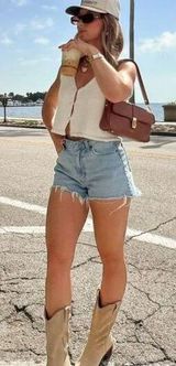 Levi's | 501 Original Cut Off Raw Hem Jean Shorts in Medium Blue Wash Photo 0