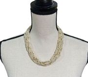 Multi strand beaded faux pearl necklace