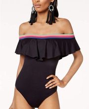 New. Trina Turk black ruffle neck swimsuit. Size 10. Retails. $159