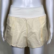 Halara High Waisted Double Layer Shorts in Cream