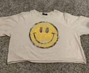 Oversized smiley face distressed tee