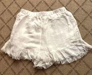 Honey Belle pleated elastic waist white flowy boho shorts w ruffle hem. NWOT S