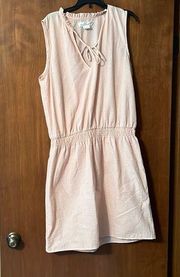 Label of graded good Cute light weight peach dress size medium