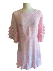 FAITHFUL THE BRAND-PINK FLORAL DRESS-SIZE  Gorgeous soft pink color with allover white daisies, 3/4 ruffle sleeves, ruffle hem, back zipper, 100% rayon, excellent condition  Measurements: Bust: armpit to armpit 18 inches Waist: side to side 15 1/2 inches  Length: shoulder seam to bottom 33 inches 