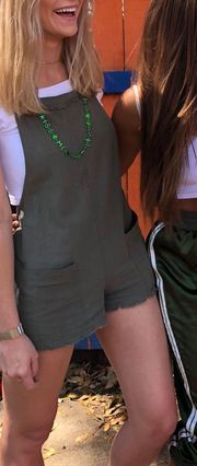 green tie shorts overalls romper