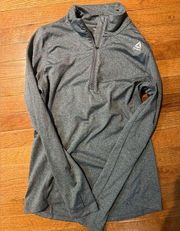 Reebok 1/4 zip pullover. Women's size small. Fitted. Gray