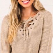 Main Strip Criss-Cross Cream Colored Sweater Large